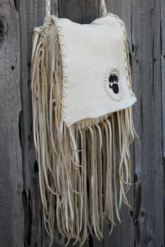 Fringed leather handbag with bear paw totem, totem handbag